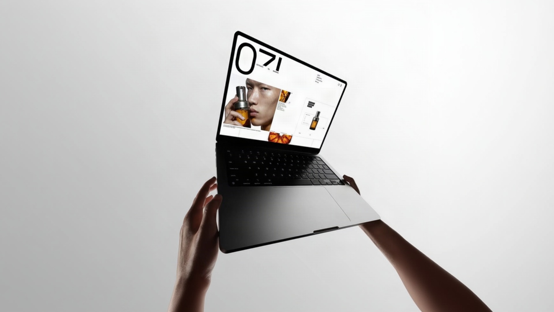A pair of hands holding an open laptop, its screen showing the Frammez call dashboard.